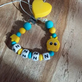 Attache sucette coeur et monstre