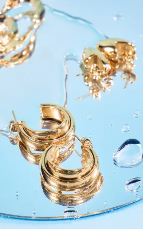Boucles d'oreilles dorées résistantes à l'eau à double anneaux