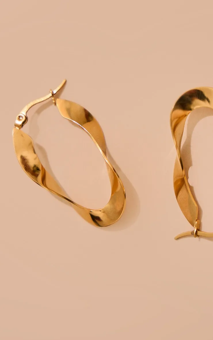 Boucles d'oreilles torsadées dorées effet abstrait résistantes à l'eau