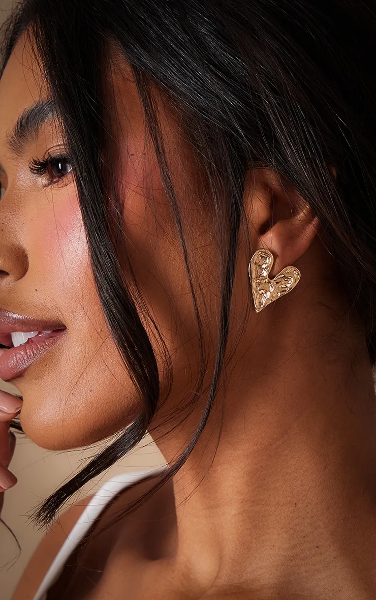 Boucles d'oreilles XXL dorées martelées à pendentifs coeurs